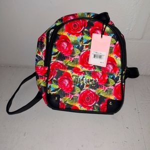 Black multi Rose pull out pouch backpack